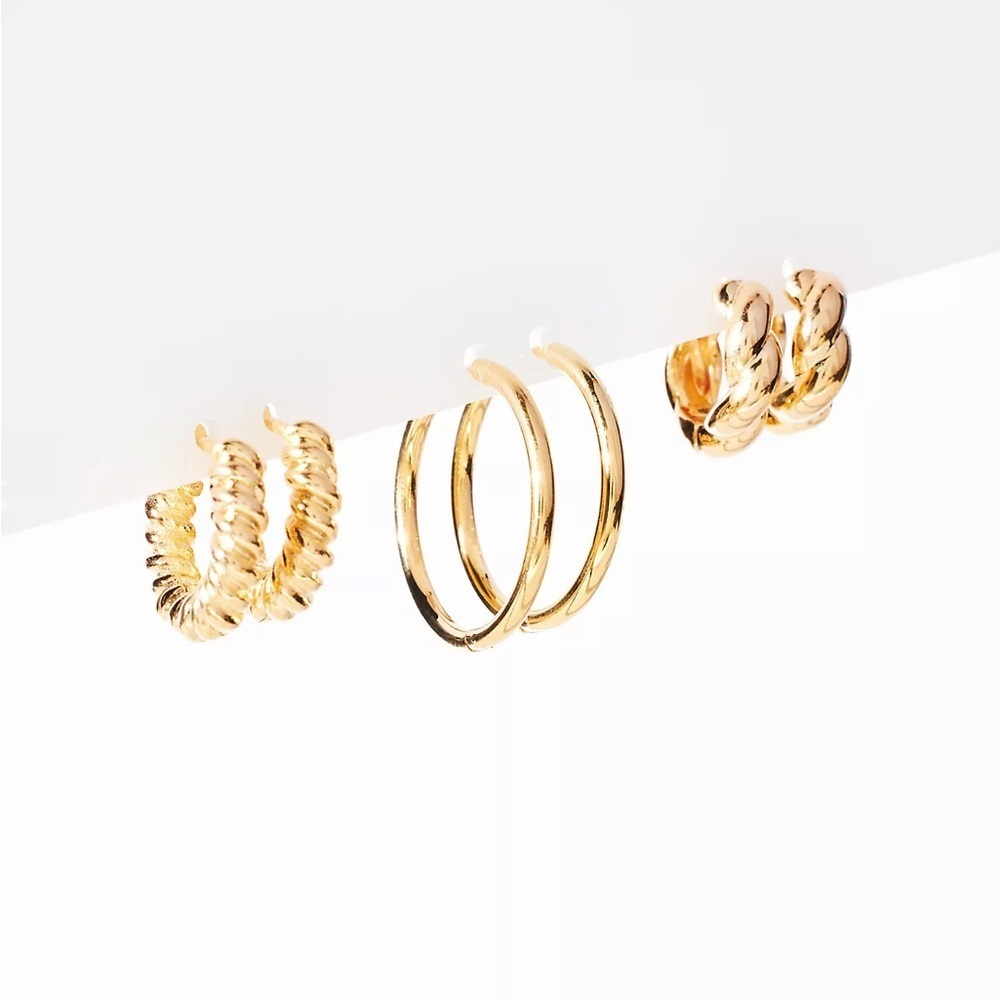NWT Set of Three Twisted Metal Huggie Earrings